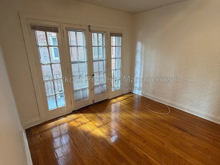 7338 Forsyth Blvd #206 — Photo 1