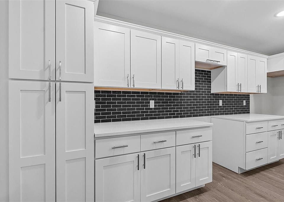 Plenty of cabinets, tile backsplash, stainless steel appliances to be added.