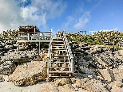 Step upto your private Tiki Beachhouse