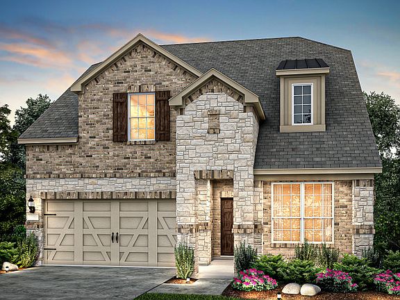The Riverdale, a two-story home with 2-car garage, shown as Home Exterior D