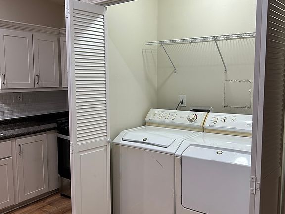washer and dryer with hanging space
