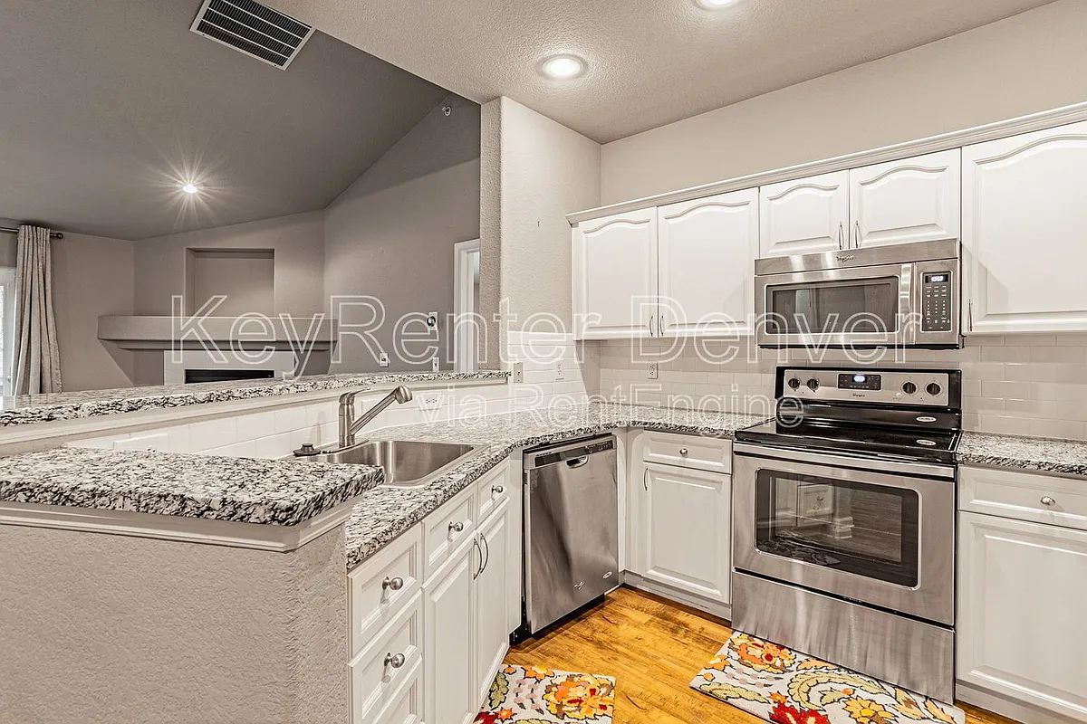 Building Photo - 7388 S Alkire St #306