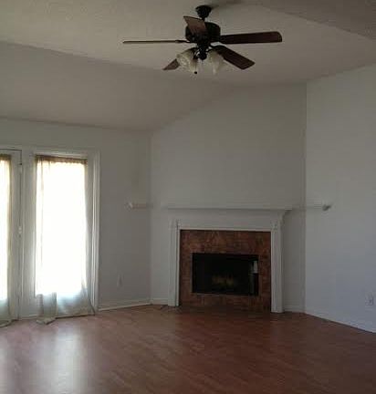 Living Room/Wood Laminate Flooring/Wood Burning Fireplace