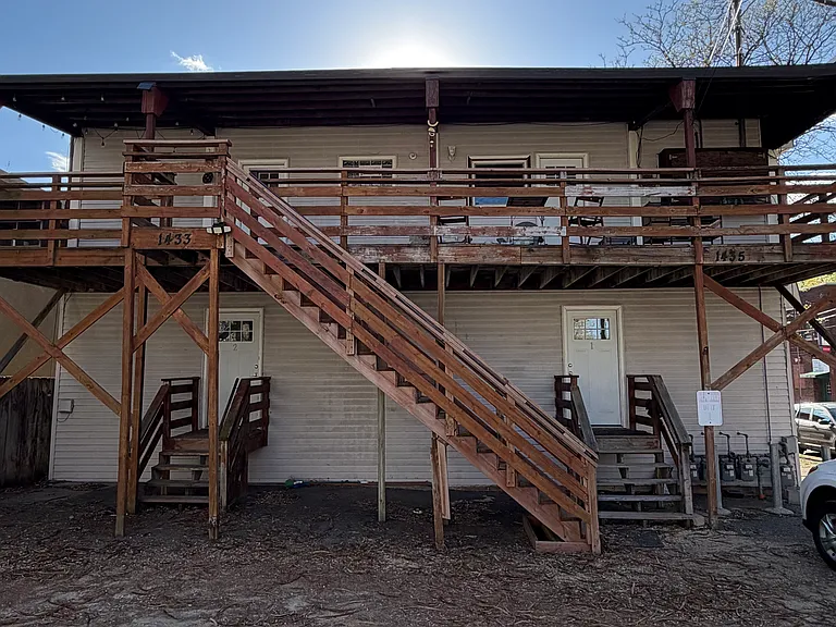 Exterior - Private entrance and large balcony ( unit is located on upper left in this photo)