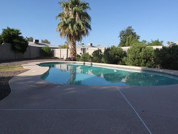 Large diving pool on corner lot