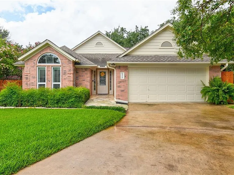 2 car garage with driveway for ample parking.
