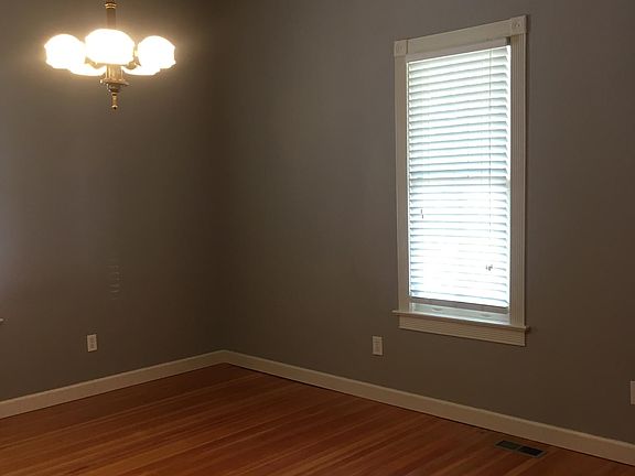 Living room is approximately 13x13 with 12 foot ceilings