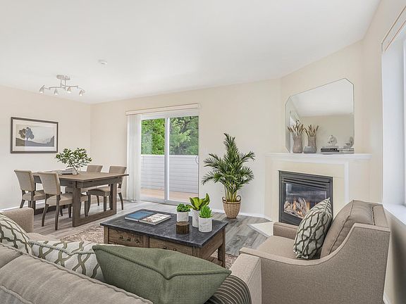 Virtually staged living and dining room.