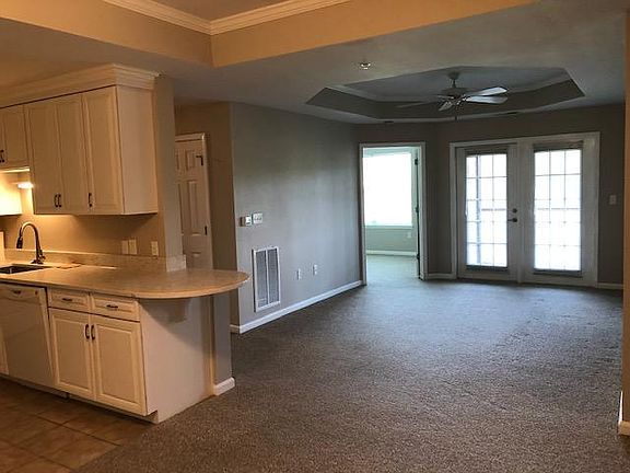 looking towards second bedroom and balcony