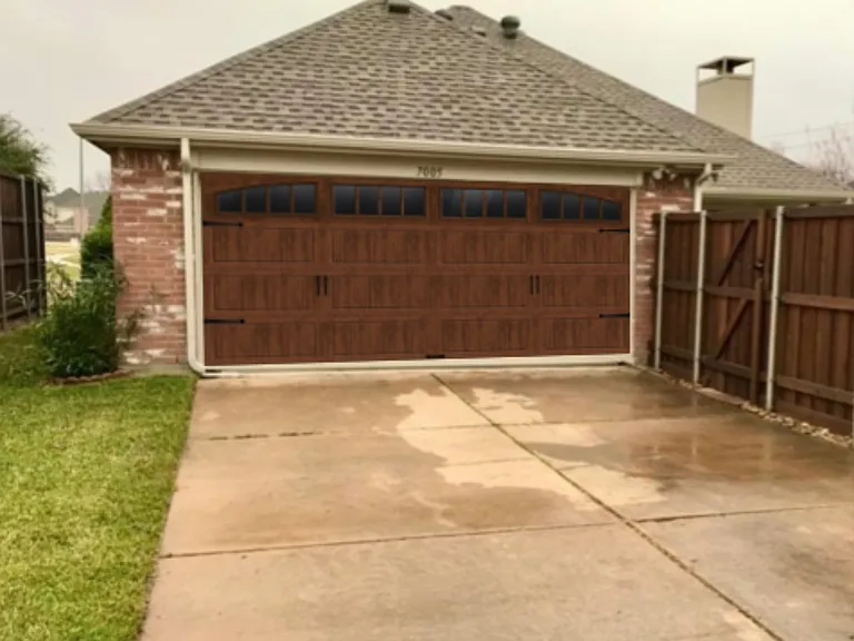 Garage door 
Fully insulated high security stainless steel garage door equipped with insulated double layer privacy glass. 
Carport will be added to this area. (coming soon).