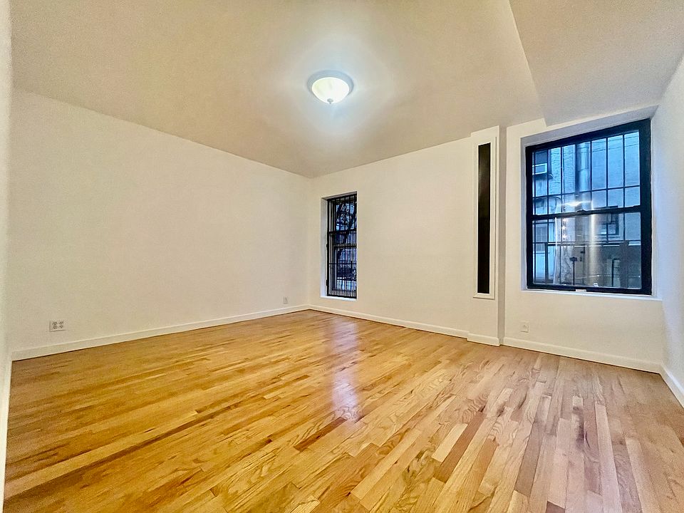 1st image of 299 E 8th St APT 3