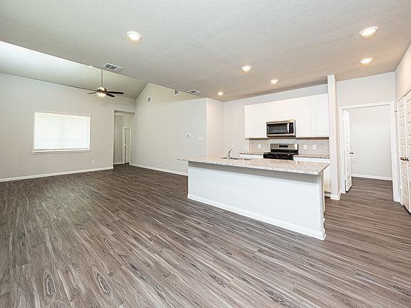 Dining Area and Kitchen to Family Room