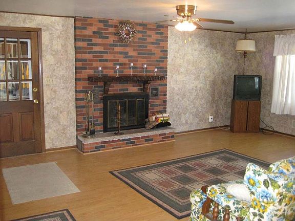 Family Room with Wood Burning Fireplace