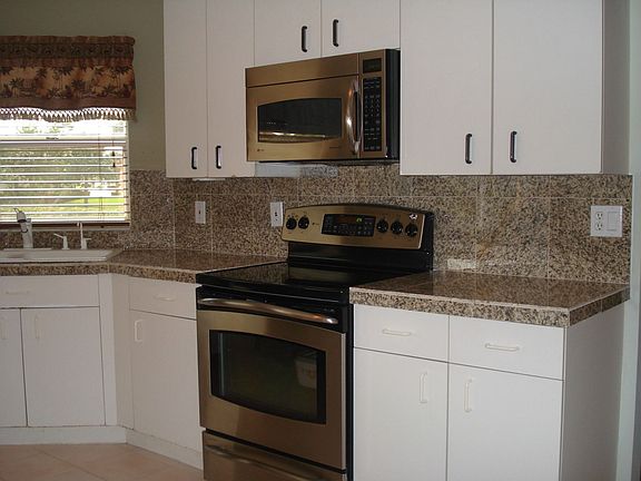 SS & Granite Tile Kitchen