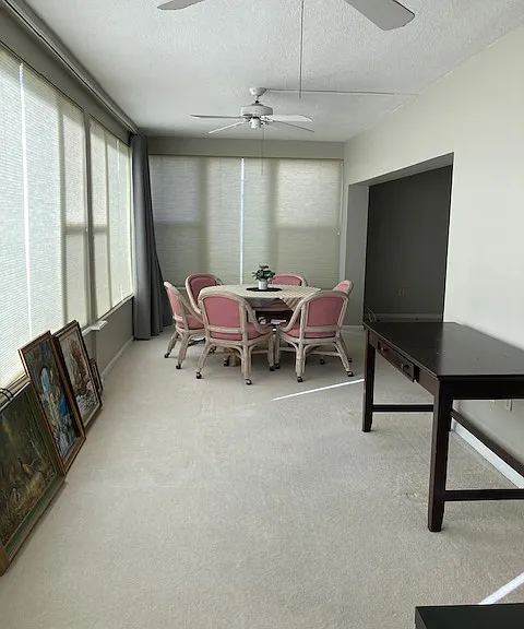 Enclosed sunroom off the living room.