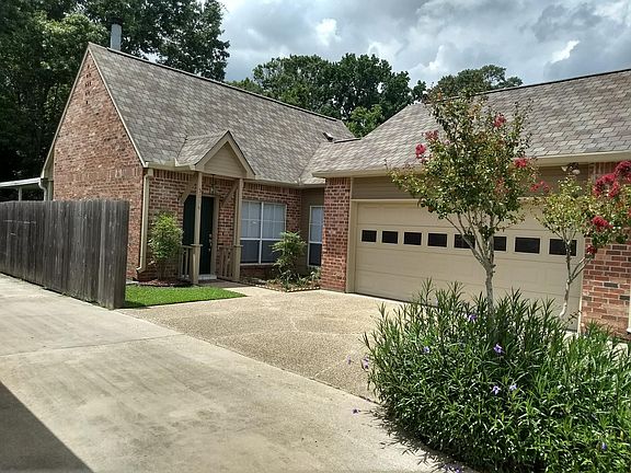 Sizeable driveway and enclosed two car garage