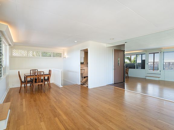 Upper-level entry; front door living room and dining nook, step up to lanai