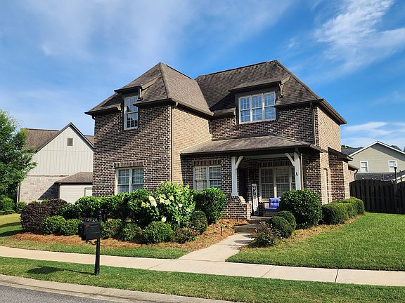 The home is located in a curve, which means is has a larger yard than most.