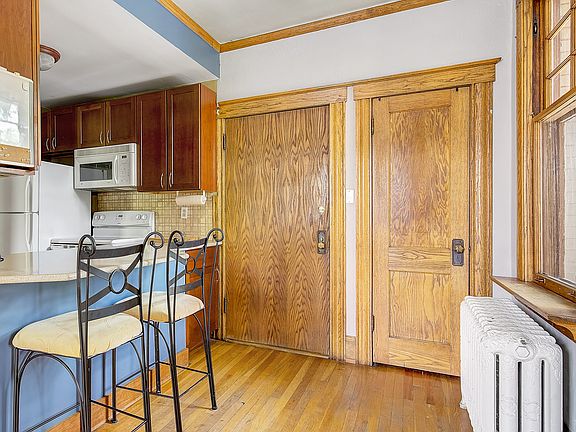 Front door and coat closet