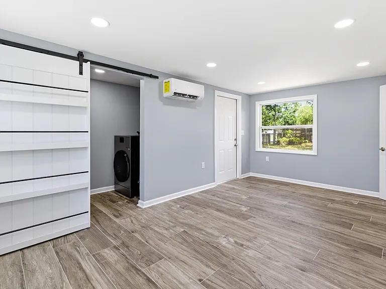 View of laundry room from bonus room
