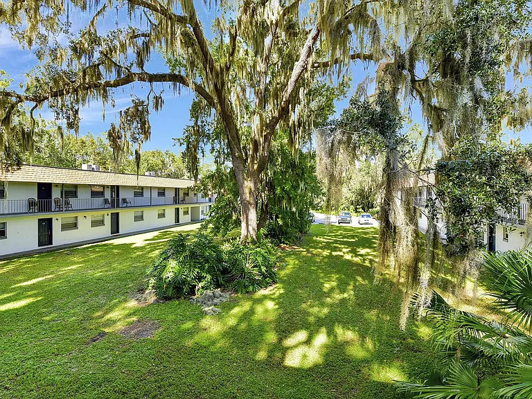 Experience the serenity of courtyard living with nature at your doorstep.