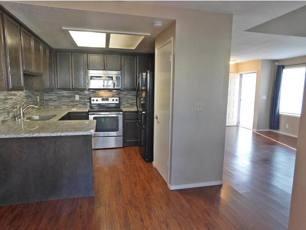 Kitchen and Living Room - 6322 Slippery Creek Ln