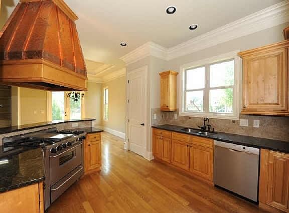 Chef's kitchen loaded with upgrades SS appliances,granite,cu