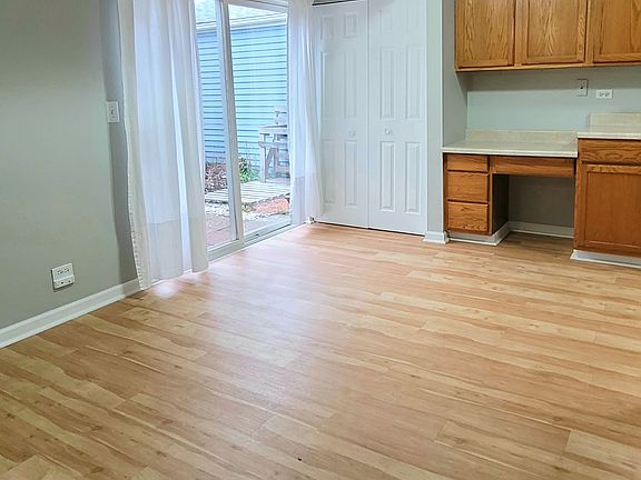 Spacious dinning room leads to private backyard