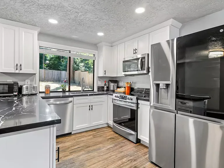 8232 SW Tygh Loop — Photo 12