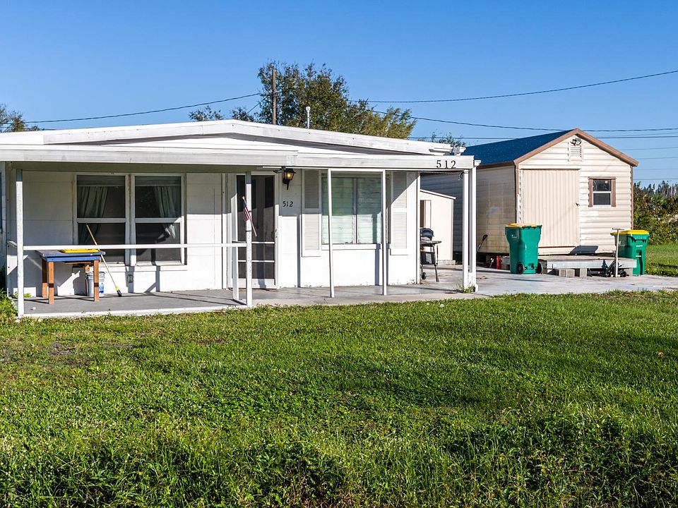 Front. Shed with Washer and Dryer