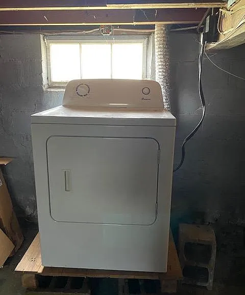 Washer & Dryer in Basement (Washing Machine not pictured). There is plenty of room for storage in the basement.