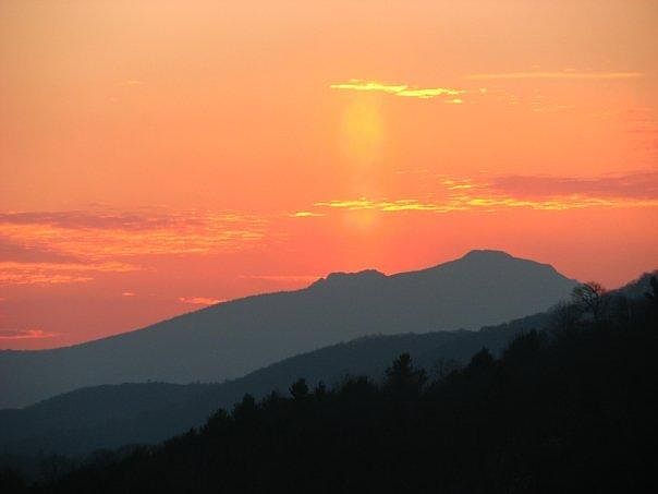 view of grandfather mtn. from back deck. waterfalls and pon