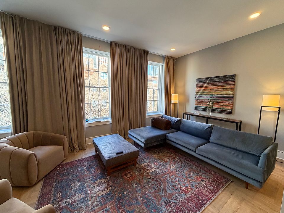 Living room overlooking Main Street from 3rd floor.