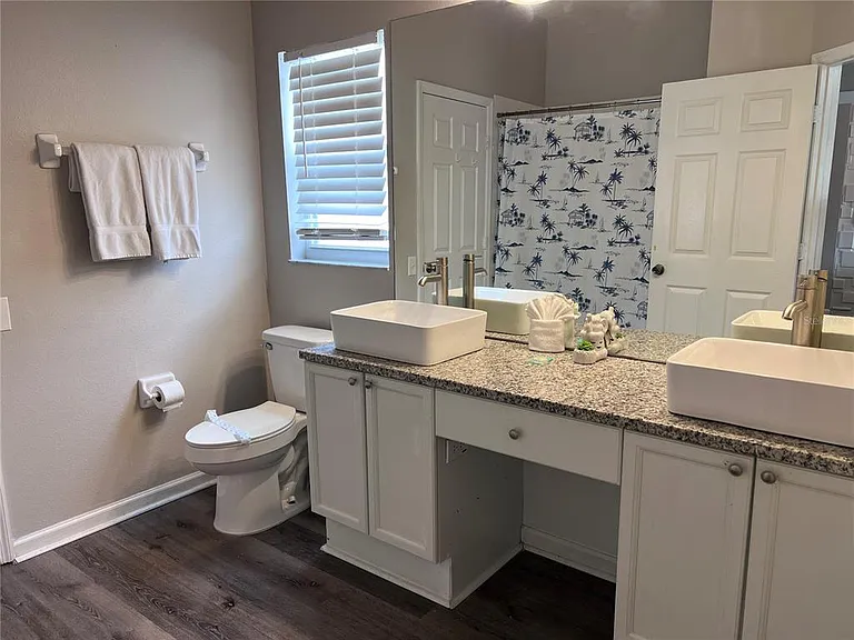8121 Fan Palm Way — Photo 36