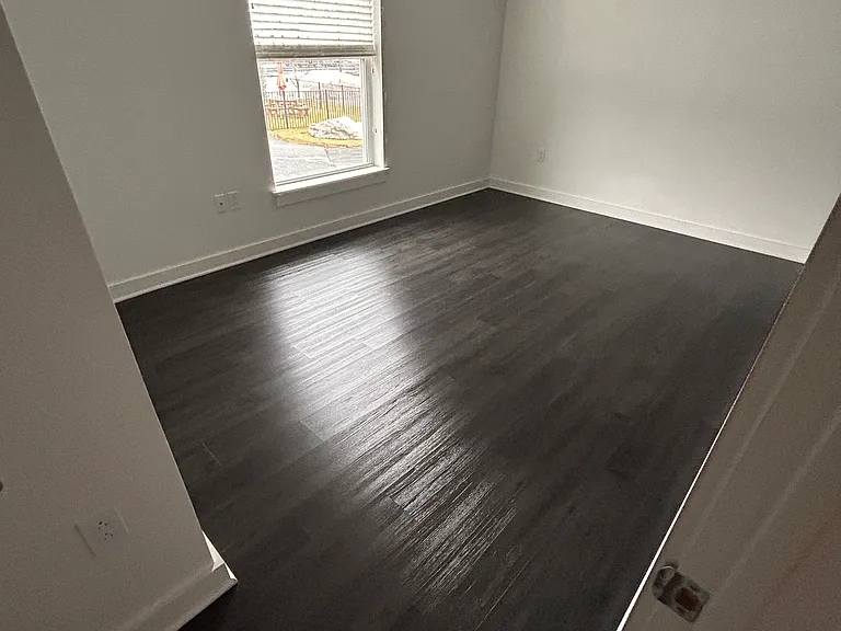 Bed Room with identicle flooring through out.