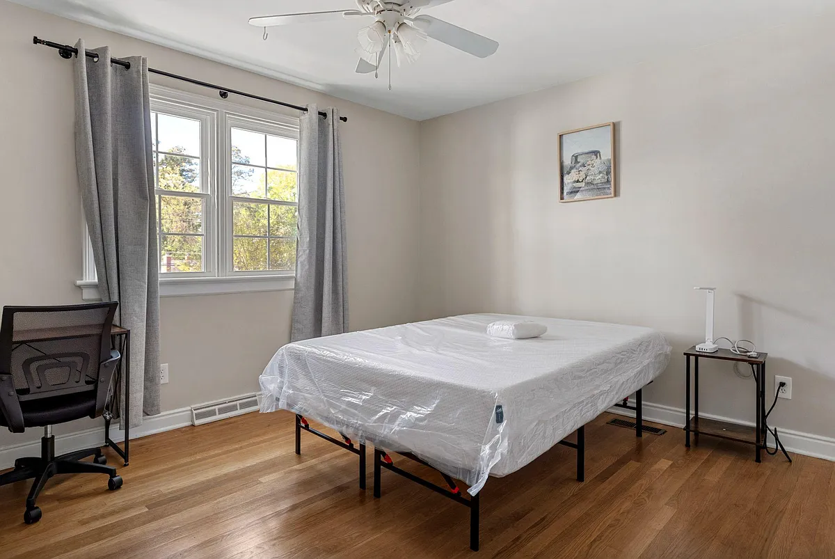 Bed room 2 - with shared bath. large window; includes a dresser, study desk, bed and bedside table. - Three Chopt Rd