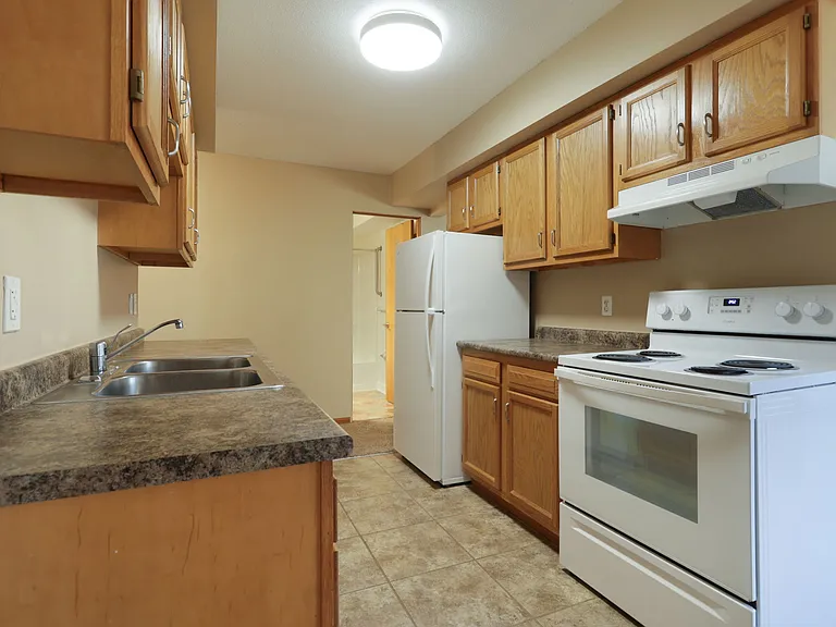 Kitchen with white appliances