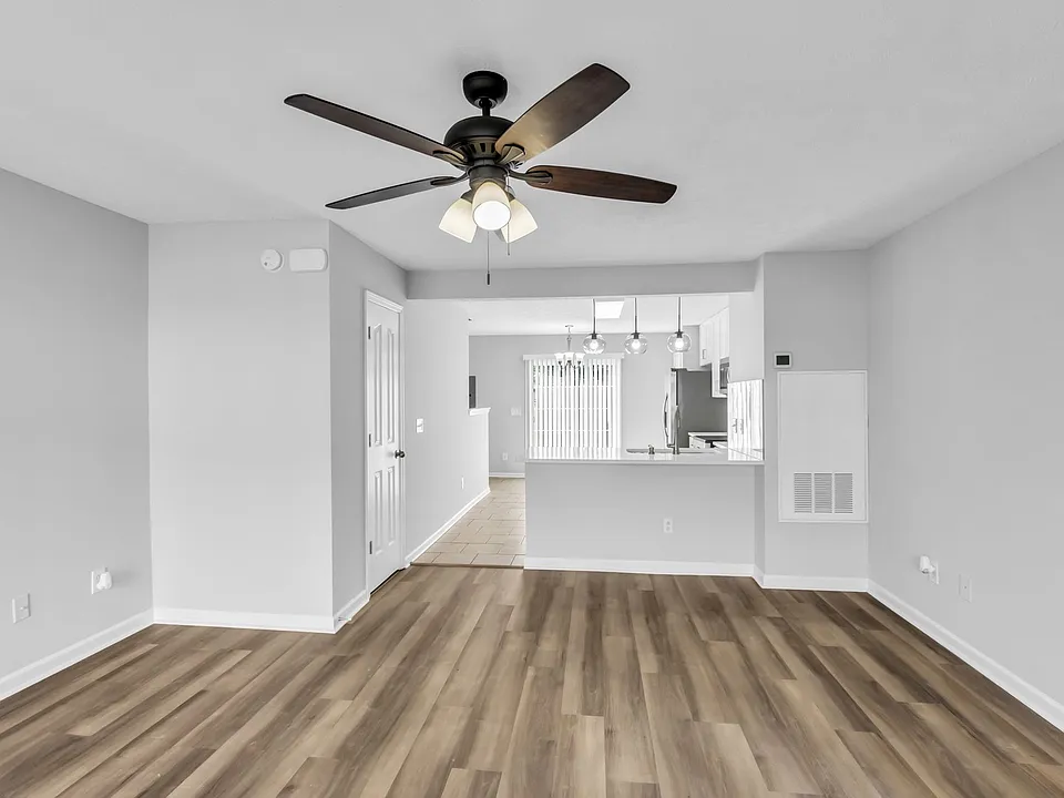 Durable, waterproof LVP flooring throughout the living room and bathrooms