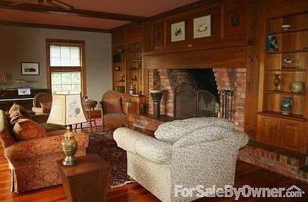 Living Room : Large Fireplace, beautiful beams and wood throughout house
