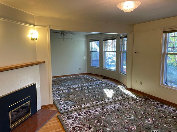 Large, bright living room and dinning room. with Gas fireplace and A/C