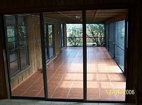 Newly Screened huge tiled porch