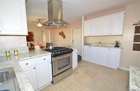 Kitchen with Travertine Flooring