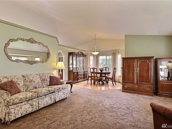 Beautiful vaulted ceiling living & dining rooms.