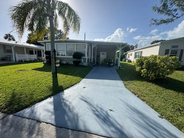 1109 Wren Cir, Barefoot Bay, FL 32976