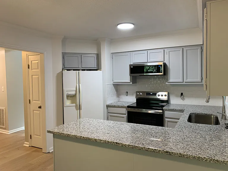 Kitchen - new range and microwave- granite countertops