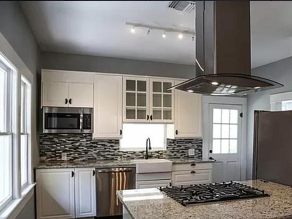 Newly renovated kitchen with stainless appliances