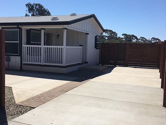 Front of home and parking area
