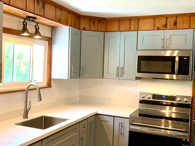 Kitchen with solid surface countertops