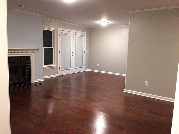 Family and dining area with patio off the dining room