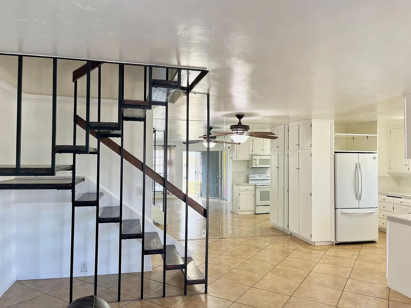 Spacious 3 Bedroom 2 Bathroom Town-Home with In-Unit Laundry, Pool and 2 Parking Spaces! — Photo 1